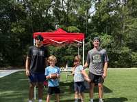 John Cooper School athletes share time and talent to mentor younger students
